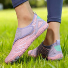 Pair of black Maeve comfort orthopedic shoes, angled shot, highlighting secure Velcro closure.