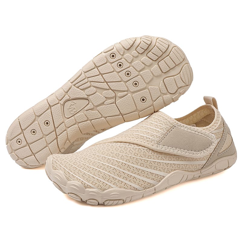 The secure fit of black Maeve comfort orthopedic shoes on a foot.