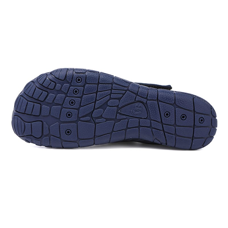 Brown Maeve comfort orthopedic shoes, on a person's foot, highlighting the fit.