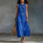Full-length side profile of the dragonfly print midi dress, highlighting its comfortable silhouette.