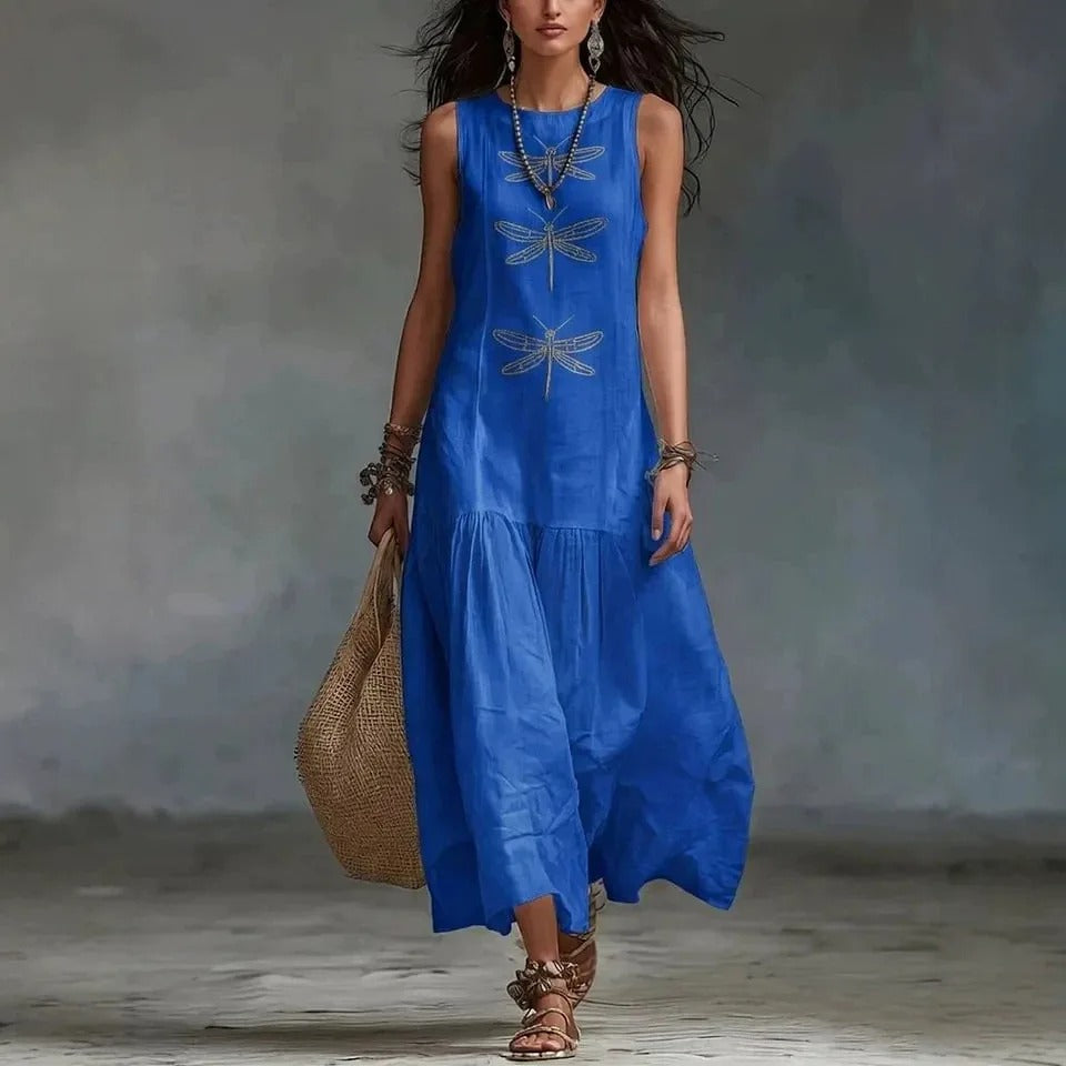 Full-length side profile of the dragonfly print midi dress, highlighting its comfortable silhouette.