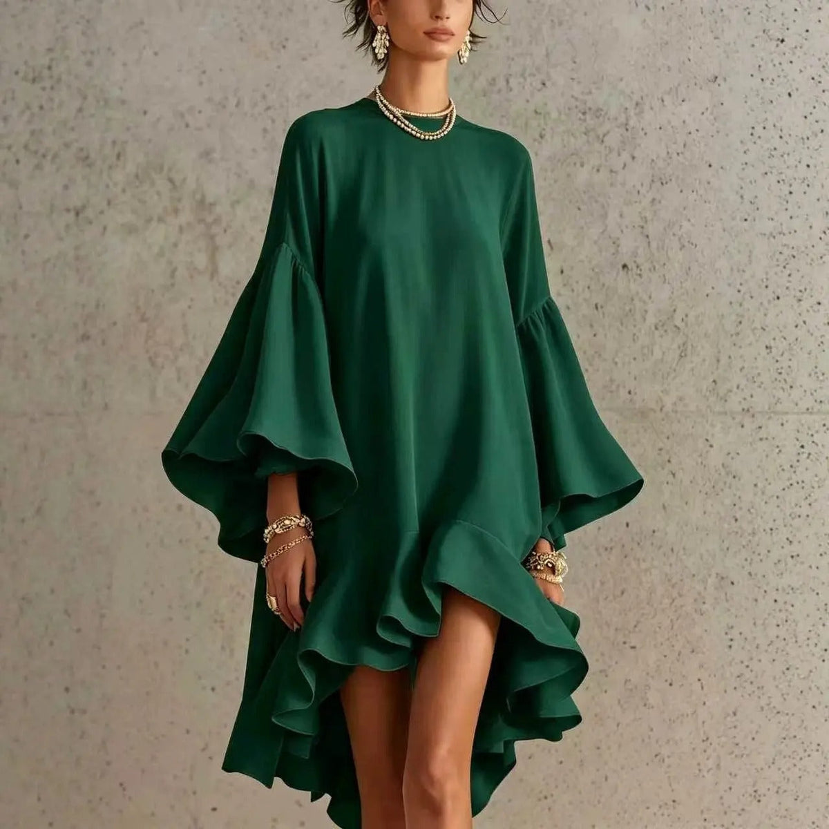 Side profile of a woman in a flowing white asymmetrical ruffle dress, highlighting the dramatic bell sleeves.