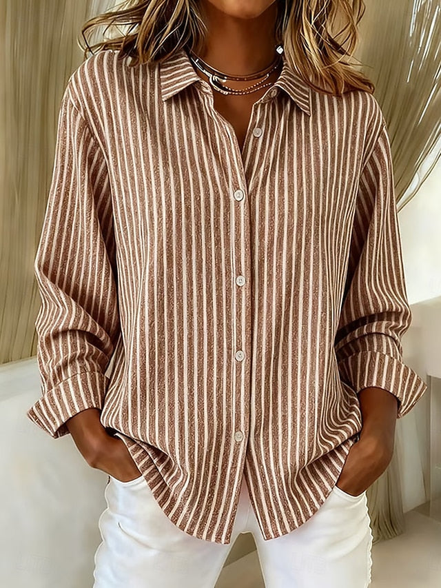 Close-up detail of the button closure and classic collar on the Nina relaxed fit shirt.