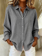 Lifestyle shot of the Nina relaxed fit shirt worn casually, emphasizing its freedom of movement.