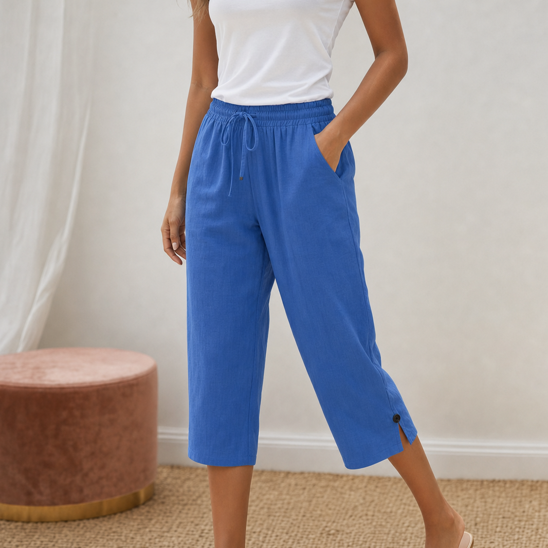 Close-up of the comfortable elastic and drawstring waistband of the women's capri trousers.