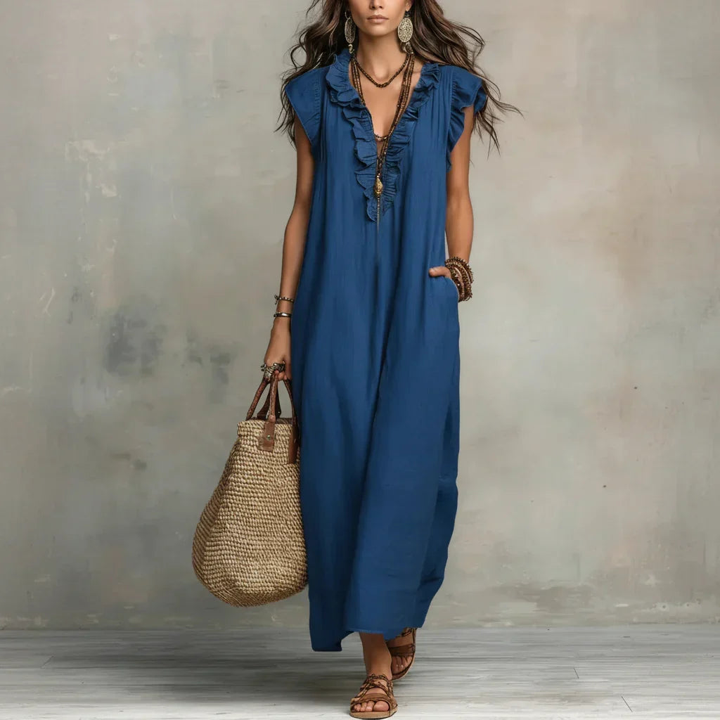 Close-up detail of the delicate ruffle accents on the neckline of the comfortable dress.