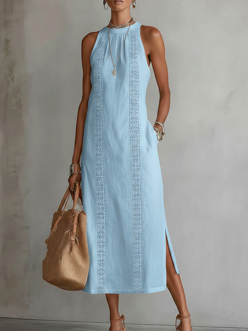 Model in a white Adara midi dress, posing gracefully to show the soft movement of the lightweight fabric.