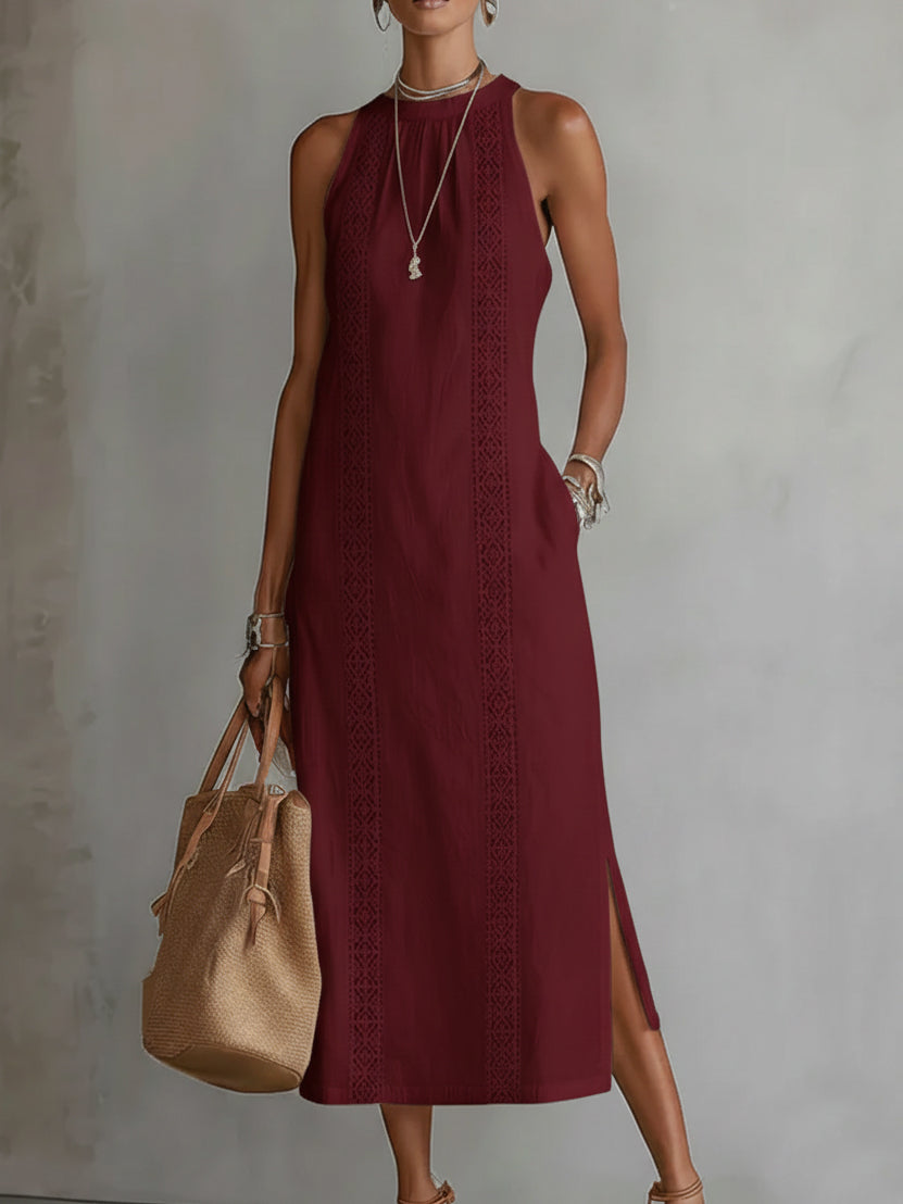 Adara dress in a vibrant yellow, laid flat to display its full length and relaxed, comfortable design.