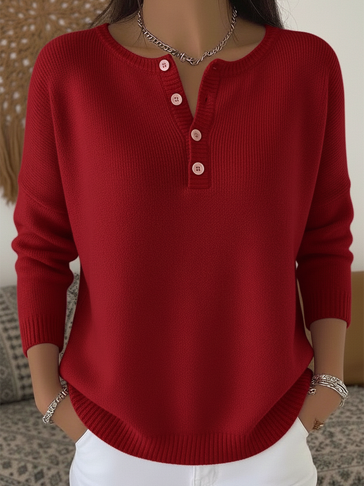 Front view of Romy comfort button-up pants in a neutral shade, showing the loose fit and button details.