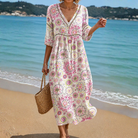 Front view of a women's Sable effortless floral midi dress in a soft, flowing fabric, perfect for summer comfort.