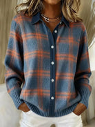 Front view of a Sable relaxed fit cardigan in a vibrant orange color, styled casually.