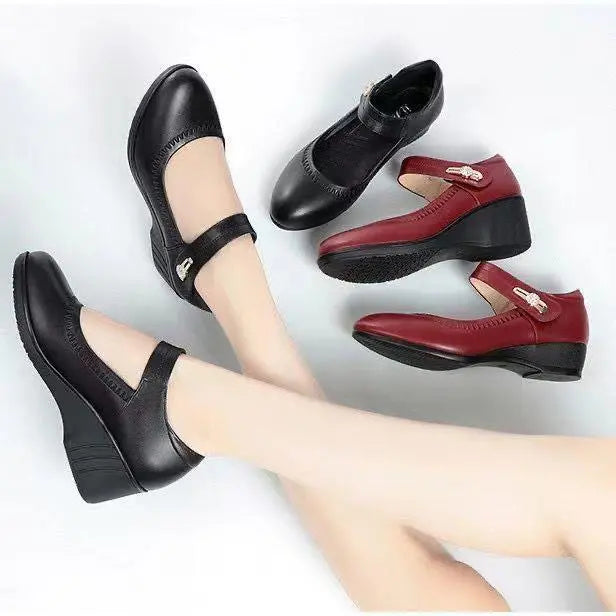 Studio shot of the Elara elegant mid-heel shoes in black, positioned to highlight the premium leather and craftsmanship.