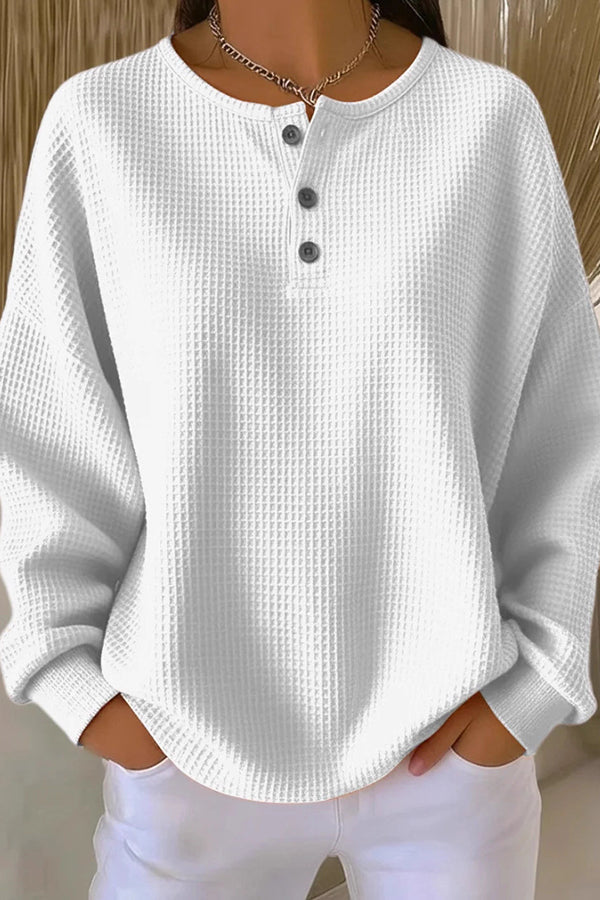 Close-up detail of the button closure and visible texture on the comfortable everyday shorts.