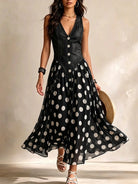 Detailed shot of the Soraya dress's waistband, illustrating how the denim top seamlessly merges with the chiffon skirt.