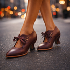 Overhead shot of a pair of Soraya leather lace-up heels, emphasizing their sleek design