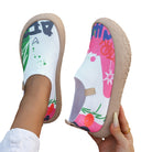 Detail shot of the cushioned sole and interior lining of the artistic slip-on shoes
