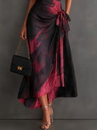 Close-up detail of the V-neck and shirt-style collar on the brown abstract print wrap maxi dress.