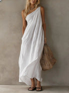 Vibrant yellow cotton-linen one-shoulder maxi dress, flowing gracefully from the front, ideal for summer events.